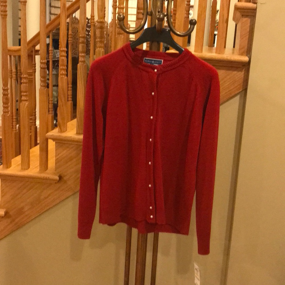 Red holiday sweater with pearl buttons